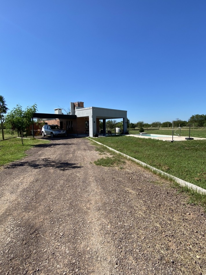 VENDE CASA QUINTA EN BARRIO LOS AROMOS 2, PUERTO TIROL